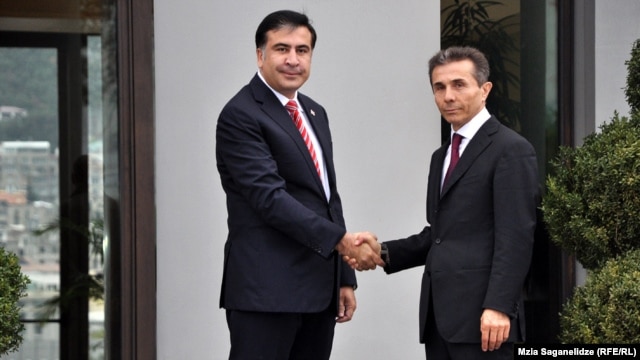 Georgian President Mikheil Saakashvili (left) met with Georgian Dream leader Bidzina Ivanishvili in Tbilisi on October 9.