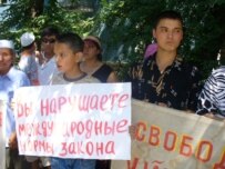 Uyghurs in Kyrgyzstan call for the release of Huseyincan Celil at a July 5 rally outside the Chinese Embassy in Kyrgyzstan (RFE/RL)