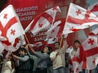 Supporters of Georgian leader Mikheil Saakashvili rally in Tbilisi on Saturday (AFP)