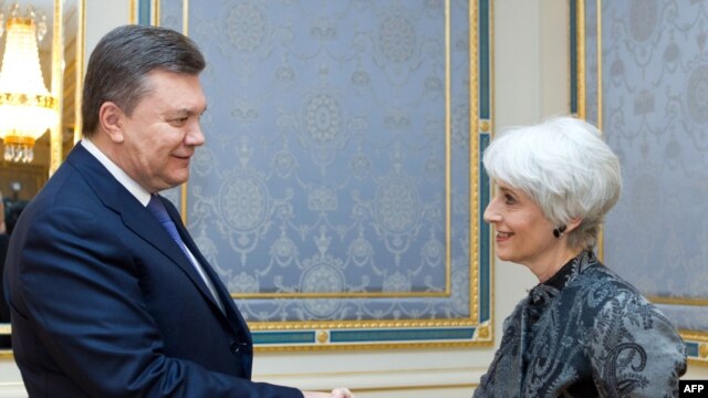 President Viktor Yanukovych greets U.S. Undersecretary of State Wendy Sherman in Kyiv on March 20. 