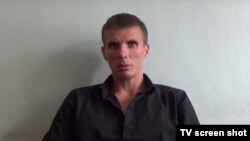 Задержанный по подозрению в участии в боевых действиях на востоке Украины гражданин Узбекистана Александр Брыкин.