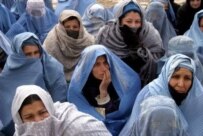 Afghan widows at a CARE lecture in Kabul in January 2006 (epa)