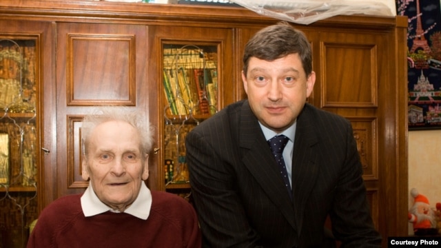 Eighty-eight-year-old Vasily Kononov (left) with his lawyer, Mikhail Loffe