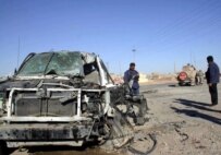 Police secure the area of the car bomb near Kirkuk today (epa)