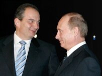 Putin (right) with Greek Prime Minister Konstantinos Karamanlis in Athens on March 14 (ITAR-TASS)