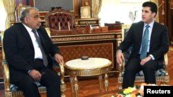 وزير النفط عادل عبد المهدي مع رئيس حكومة إقليم كردستان نيجيرفان بارزاني