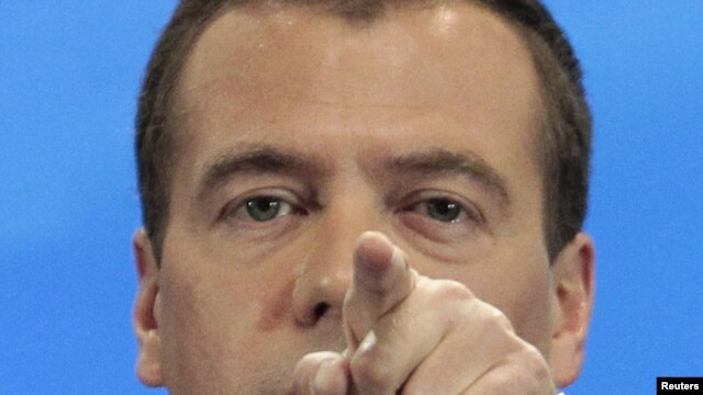 President Dmitry Medvedev gestures during a press conference at the Skolokovo innovation center outside Moscow on May 18.