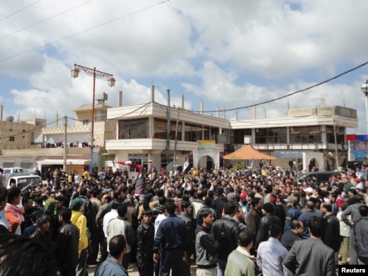 نمایی از تظاهرات روز جمعه در شهر درعا سوریه