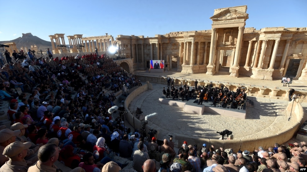 Russian conductor Valery Gergiev leads a concert in the amphitheater of the ancient city of Palmyra on May 5, 2016, after its liberation by Syrian and Russian forces.