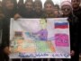 Бер төркем сүрияле Әсадка вето ярдәмендә җан өрергә тырышкан Путин карикатуры белән, Кфар Нубул
