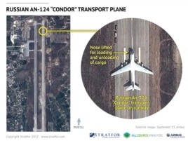 Российский военно-транспортный самолет АН-124 на авиабазе ВВС Сирии вблизи порта Латакия. Фото с космического спутника. 15 сентября