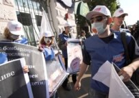 Members of a pro-Kremlin youth group tried to block the conference (RFE/RL)