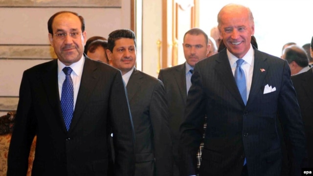 Despite a recent visit from U.S. Vice President Joe Biden (right), Iraqi Prime Minister Nuri al-Maliki has shown no inclination to interfere in the vetting commission's banning of candidates.