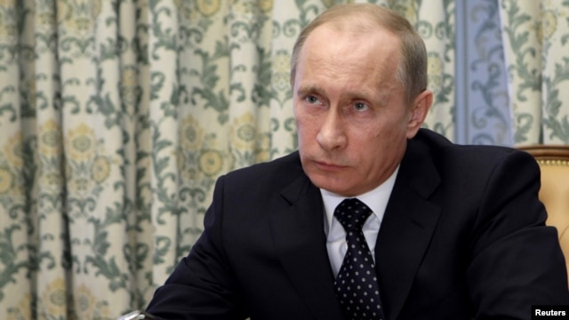 Prime Minister Vladimir Putin takes part in a video conference in response to the March 29 attacks. 
