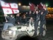 Young men celebrate the Rose Revolution in Georgia in 2003.  RFE/RL’s Georgian Service was there to cover it.