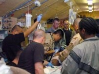 U.S. medical personnel treat a victim of today's bombing (epa)