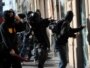 Участники протестов в Риме громят офис одного из банков