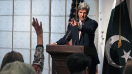 U.S. Senator John Kerry, seen here at a press conference in Pakistan in 2011, has called out Islamabad.
