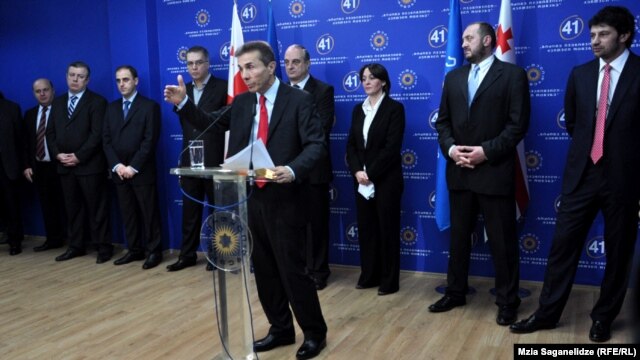 Georgian Prime Minister-nominee Bidzina Ivanishvili speaks during a ceremony to present new ministerial nominees at his office in Tbilisi on October 16, including Kakha Kaladze (right).