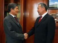 President Bakiev (right) with Almaz Atambaev in Bishkek on March 21 (Courtesy Photo)