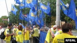 Ukrainian People's Party activists protest at the Russian Embassy in Kyiv.