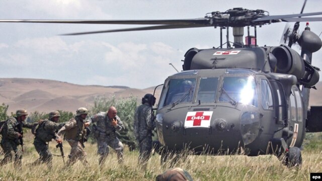 U.S. and Georgian soldiers take part in a joint military exercise at Georgia's Vaziani base in July.