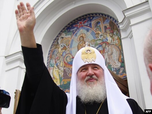 Patriarch of Moscow and All Russia Kirill waves during his visit to Odesa on July 20.