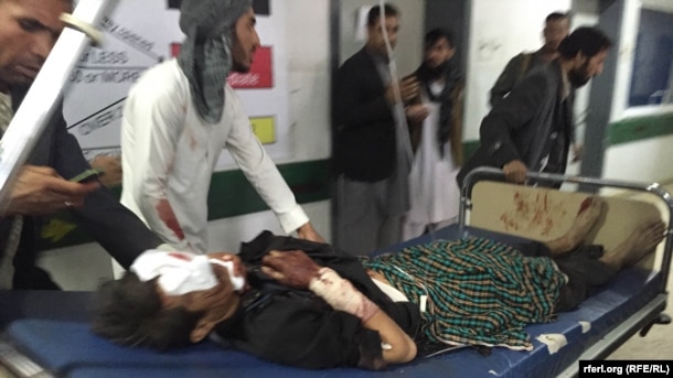 Wounded arrive at a hospital in Balkh.