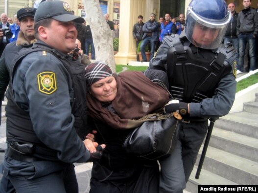 Riot police break up the protest in Baku on April 2. (file photo)