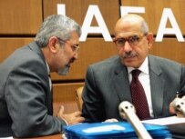 Iranian Ambassador to the IAEA Ali Ashgar Soltanieh (left) talks with IAEA Secretary-General Muhammad el-Baradei in Vienna on November 23 (epa)