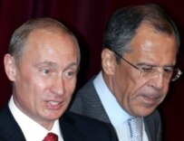 Putin (left) with Foreign Minister Sergei Lavrov at the Russian Foreign Ministry today (epa)