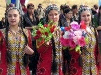 Turkmen women in traditional dress at a festival in Ashgabat