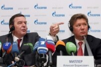 Former German Chancellor Gerhard Schroeder (left) with Russia's Gazprom CEO Aleksei Miller on March 30 (epa)