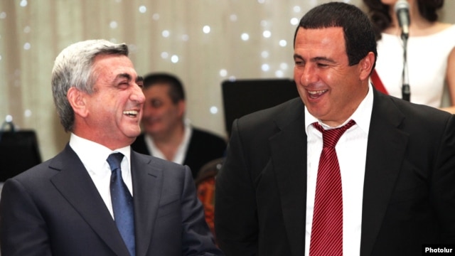Armenia - President Serzh Sarkisian (L) and Prosperous Armenia Party leader Gagik Tsarukian attend an official celebration in Yerevan.