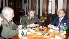 Armenia - Seyran Ohanian (R), Armenian Minister of Defence, Valery Gerasimov (C), Chief of Russian Armed Force's General Staff, and Yuri Khachaturov, Chief of Armenian Armed Force's General Staff, meet in Yerevan,15Feb,2013