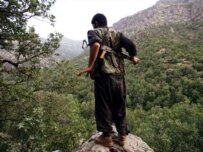 A PKK fighter in Iraq near the Turkish border in June (AFP)