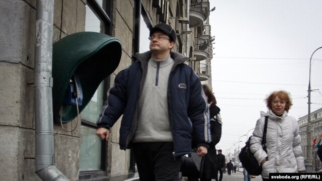 Ales Mikhalevich walks to KGB offices in Minsk for questioning in March, three months after his challenge in the tainted Belarusian presidential election.