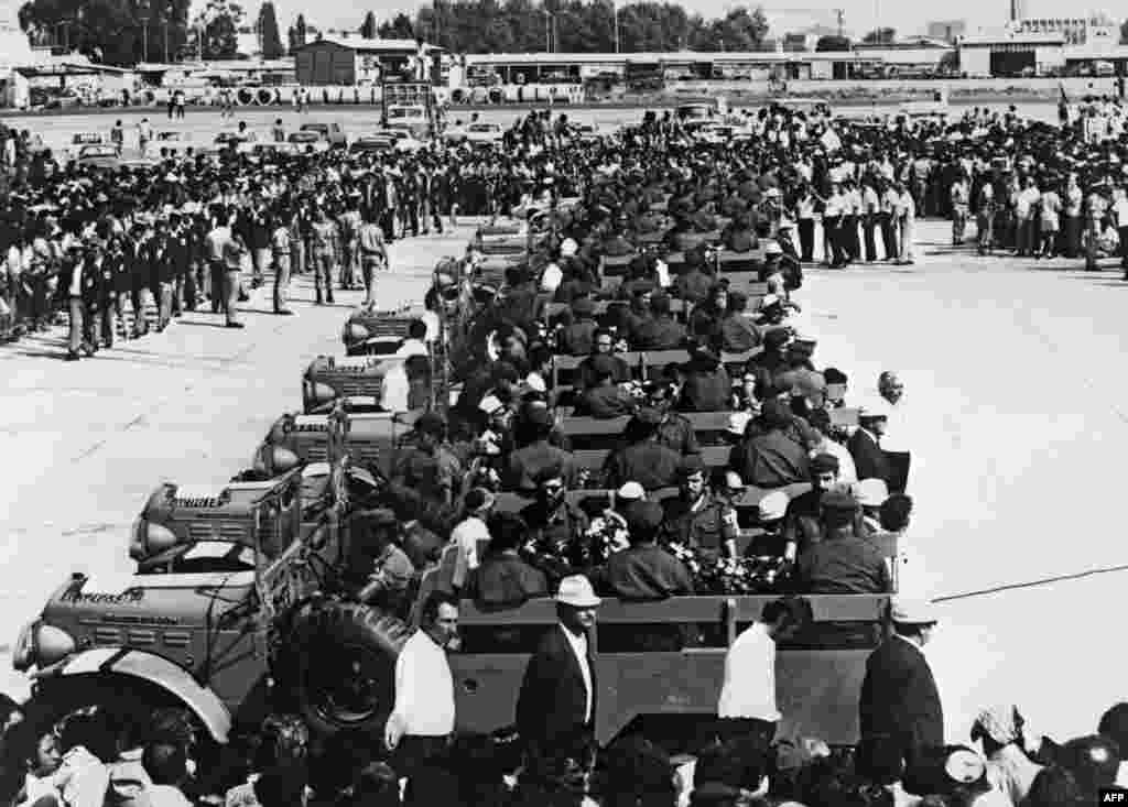 The caskets of Israeli Olympic team members killed by the hostage takers are transported on military vehicles at Lof Airport on September 8, 1972.