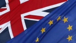 U.K. -- The EU and the Union flags fly outside The European Commission Representation in the United Kingdom in central London, 23Jan2013