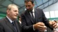 Vlade Divac (right) chats with International Olympic Committee President Jacques Rogge in Belgrade in 2010.
