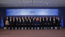 European Union leaders pose for a photo at the EU summit in Brussels on October 18.