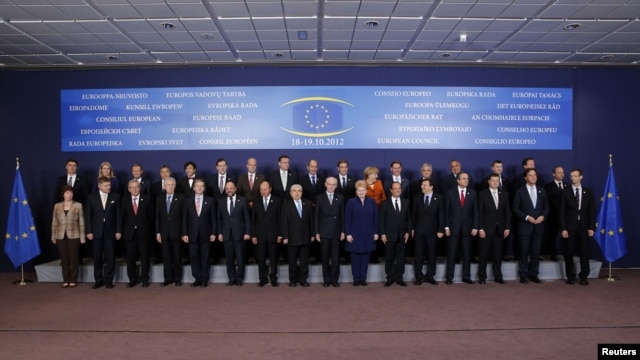 European Union leaders pose for a photo at the EU summit in Brussels on October 18.