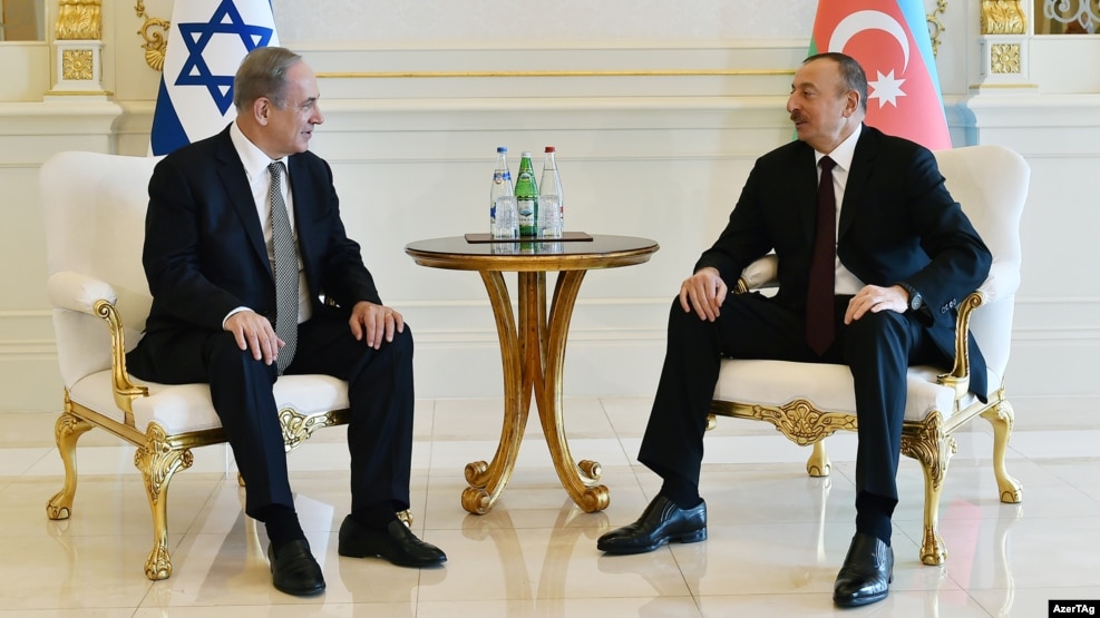 Azerbaijani President Ilham Aliyev (right) meets with Prime Minister of Israel Benjamin Netanyahu in Baku on December 13.