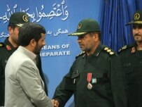Ahmadinejad (left) giving state awards to the officers who detained the Britons, shortly before he announced they would be released (Fars)