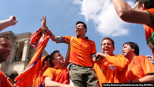 Dutch fans celebrate in the fan zone in Kyiv on June 8.