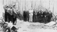 Leaders of the Jewish community of the town of Balti (right) are seen before their execution on July 15, 1941. German soldiers stand at left. (Photo: Matatias Carp, Cartea Neagra - Bucharest, 1947 - Volume III)  