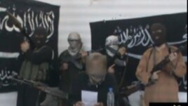 A screen grab of an undated video of Jund al-Khilafah (Soldiers of the Caliphate) militants threatening the Kazakh government.