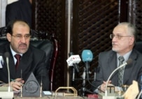 Prime Minister al-Maliki (left) and Oil Minister al-Shahristani on August 29 (epa)
