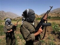 PKK fighters patrol along Iraqi side of Iraq-Turkey border (file photo) (AFP)