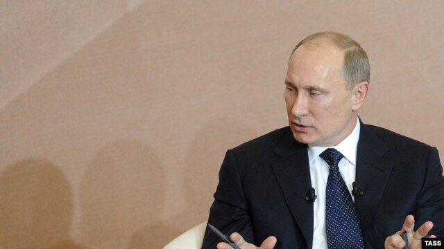 Prime Minister Vladimir Putin speaks at a Forum of the Peoples in the southern Russian city of Kislovodsk on January 23.
